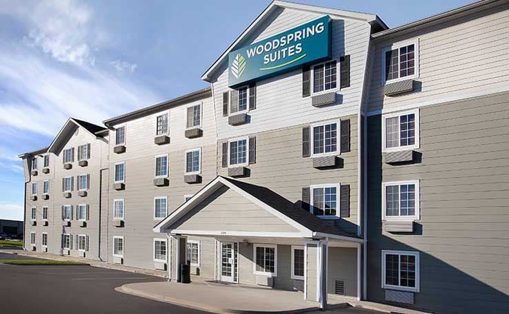 WoodSpring Suites Baton Rouge East I-12 photo 1 of 14