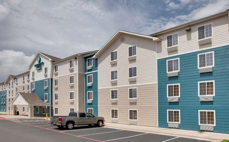 Extended Stay Hotels in Baytown, TX | WoodSpring Suites