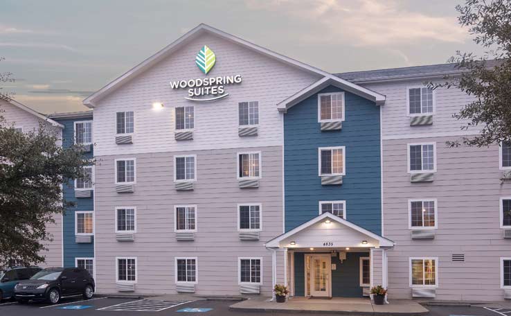 WOODSPRING SUITES CHARLESTONAPT EXTENDED STAY HOTEL EXTERIOR DUSK 2 738x456