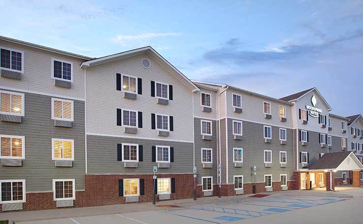 Extended Stay Hotels In Denton, TX | WoodSpring Suites