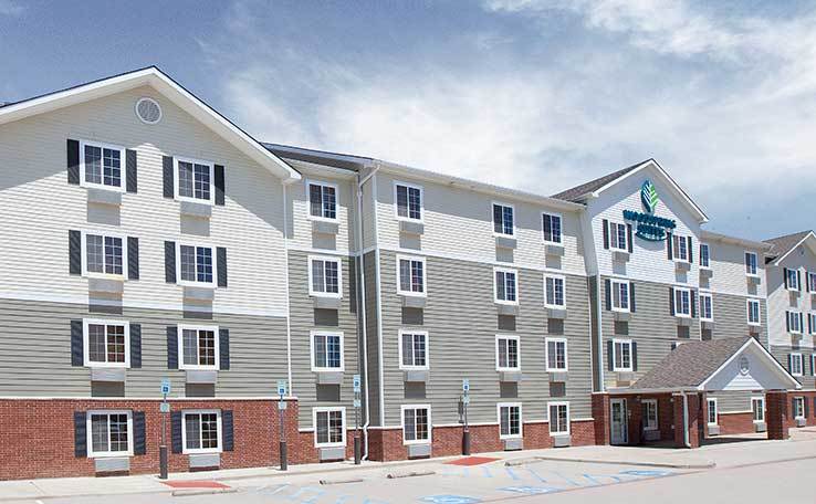 Extended Stay Hotels In Denton, TX | WoodSpring Suites