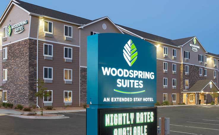 Extended Stay Hotel In Grand Junction CO WoodSpring Suites Grand   WoodSpring Suites Grand Junction Extended Stay Hotel Dusk 3 Exterior 738x456~800 