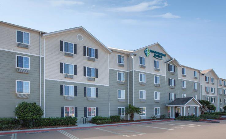 Extended Stay Hotel In Jacksonville FL WoodSpring Suites   WOODSPRING SUITES JACKSONVILLESE EXTENDED STAY HOTEL EXTERIOR DAY 2 738x456~800 