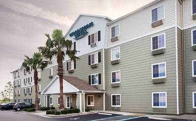 Extended Stay Hotel In Jacksonville FL WoodSpring Suites   WoodSpring Suites Jacksonville I 295 East Extended Stay Hotel Exterior 1 738x456~400 