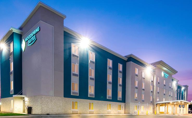 Extended Stay Hotels in Irving, TX | WoodSpring Suites