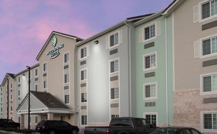 Extended Stay Hotel In Miami FL WoodSpring Suites   WOODSPRING SUITES MIAMISW EXTENDED STAY HOTEL EXTERIOR DUSK 2 738x456~800 